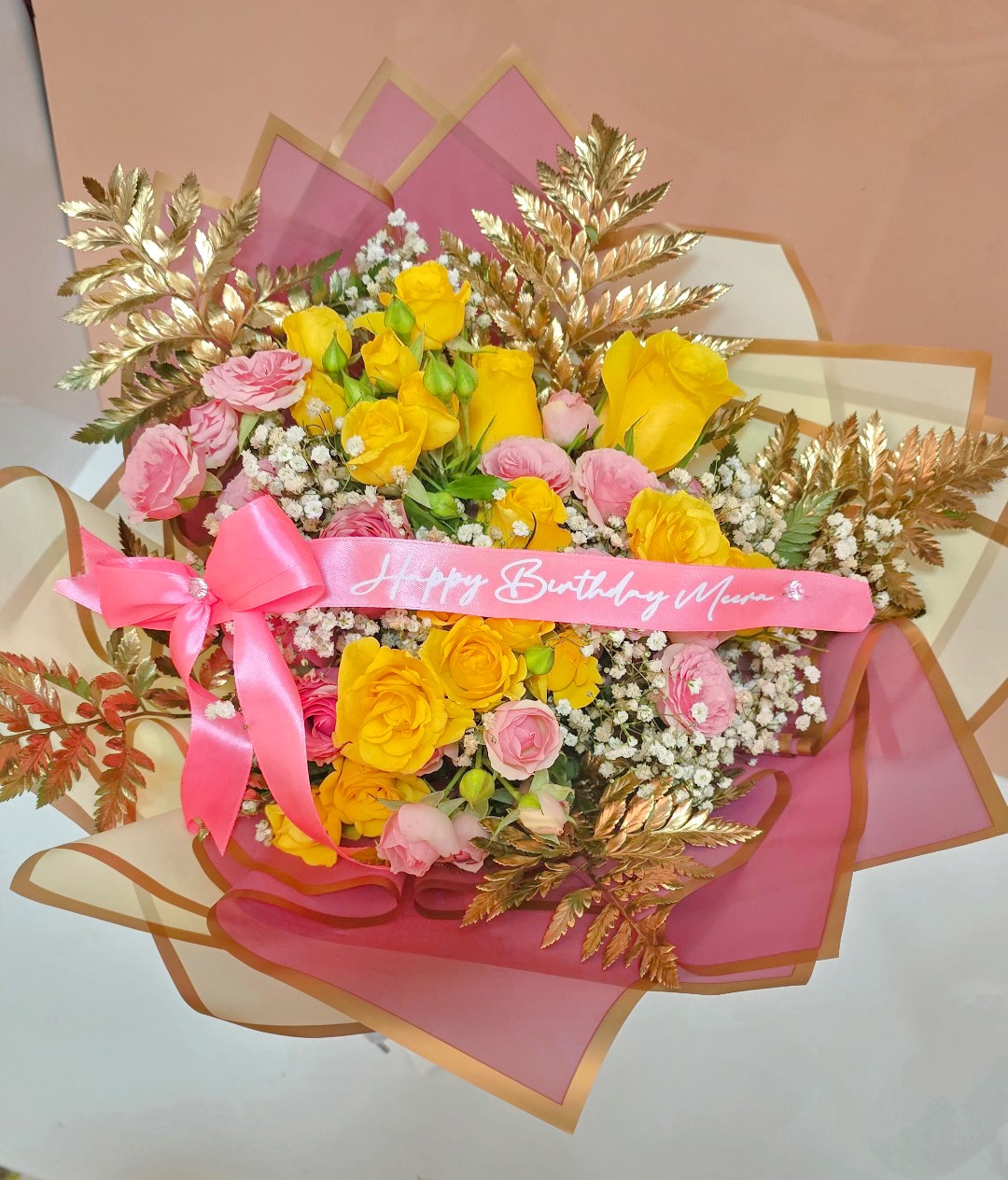 Yellow and pinks floral arrangement